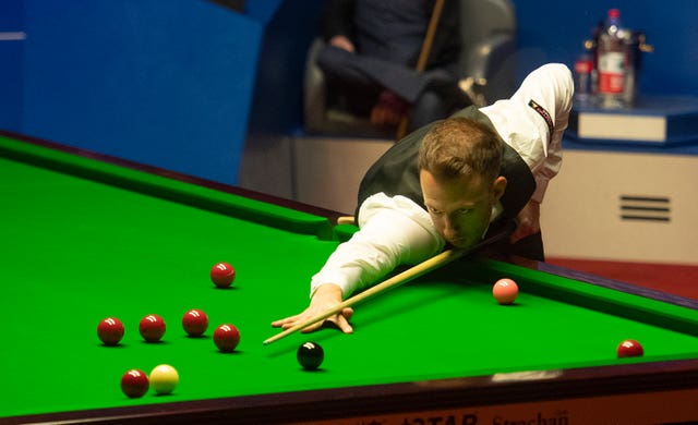 Judd Trump on his way to winning the World Championship final