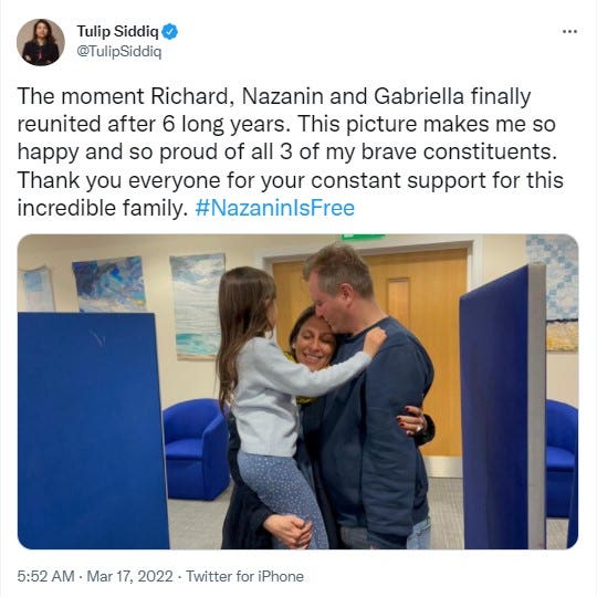 Screen grab from the Twitter feed of Tulip Siddiq @TulipSiddiq of Nazanin Zaghari-Ratcliffe being reunited with her husband Richard Ratcliffe and their daughter Gabrielle at RAF Brize Norton in Oxfordshire (Tulip Siddiq/Twitter)