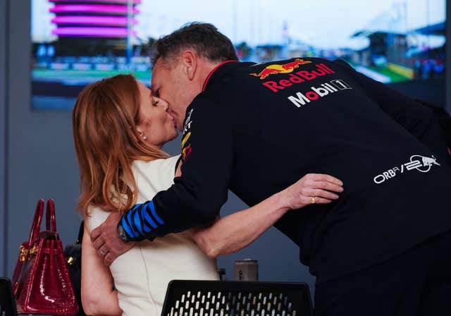 Christian and Geri Horner kiss before the Bahrain Grand Prix