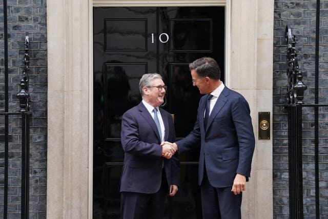 Prime Minister Sir Keir Starmer, left, shakes hands with Nato secretary-general Mark Rutte as he leaves Downing Street