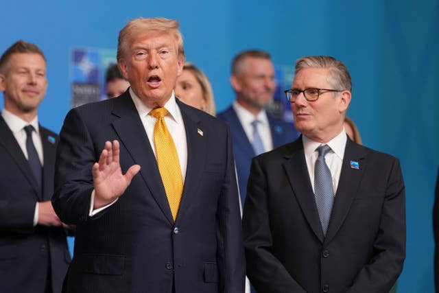 Donald Trump, left, standing next to Keir Starmer, right