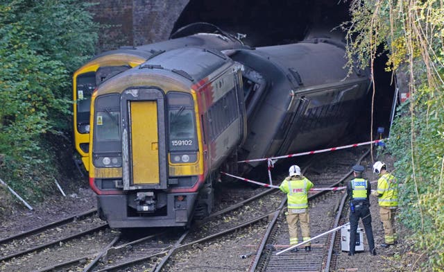 Police and firefighters at the scene of the crash