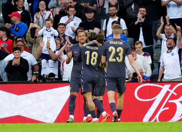 Harry Kane, left, celebrates his goal against Bosnia and Herzegovina