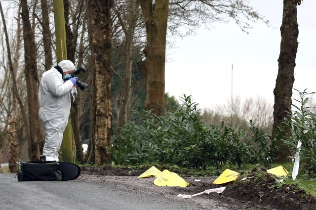 A forensic officer at the scene
