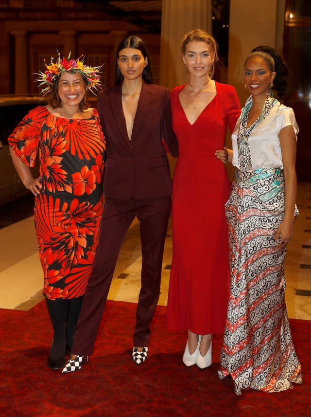Artisan fashion designer Marama Papau, left, poses with models Neelam Gill, Arizona Muse and Noella Coursaris (Peter Nicholls/PA)