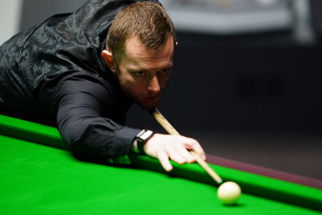 Mark Allen plays a shot 