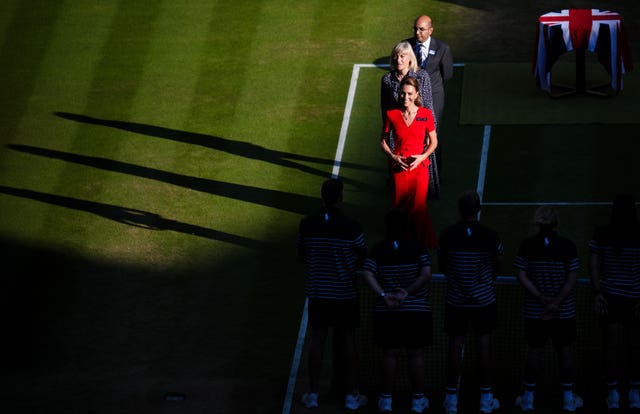 Kate walks through light and shade at Centre Court