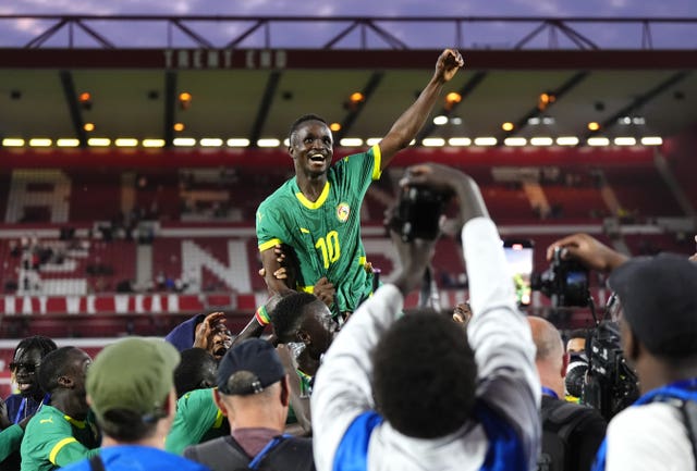 Cheikh Sabaly celebrates Senegal's win