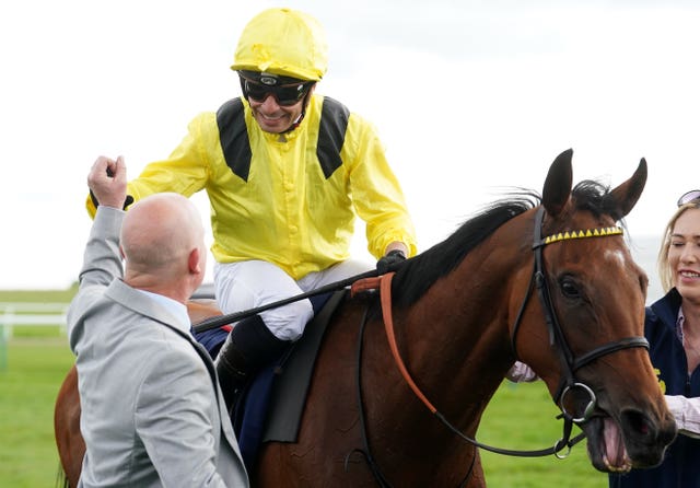 Elmalka and Silvestre de Sousa after winning the 1000 Guineas