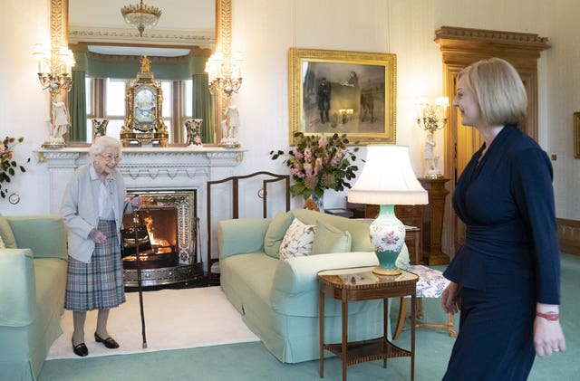 Queen Elizabeth II welcomes Liz Truss during an audience at Balmoral, Scotland, where she invited the newly elected leader of the Conservative party to become prime minister and form a new government