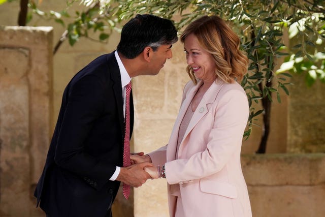 Prime Minister Rishi Sunak is greeted by Italian Prime Minister Giorgia Meloni during a welcome ceremony at the G7 leaders’ summit at the Borgo Egnazia resort, in Puglia, Apulia, Italy