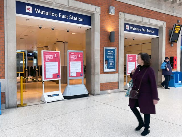 A passenger at Waterloo East train station in London during a rail strike by members of the Rail, Maritime and Transport union in a long-running dispute over jobs and pensions