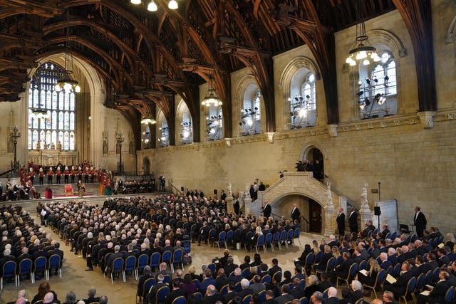 King Charles III and the Queen Consort at Westminster Hall, London, on Monday