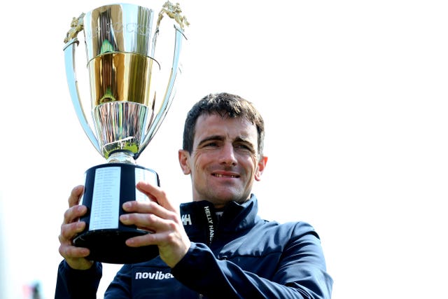 Hughes with his trophy 