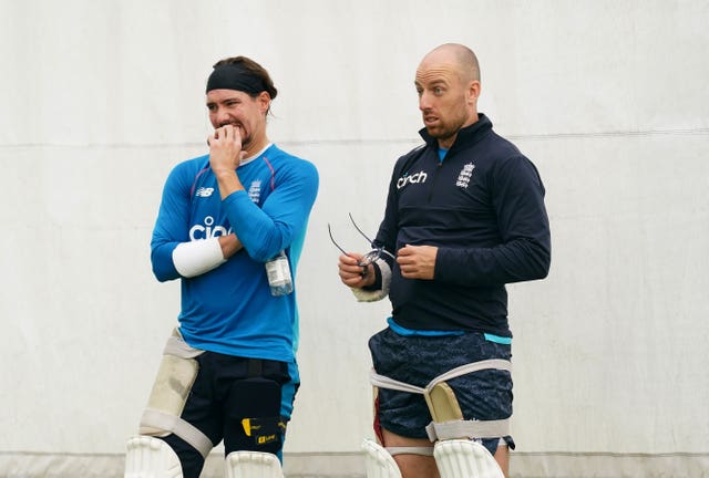 Rory Burns (left) and Jack Leach (right) had bruising times in Brisbane.
