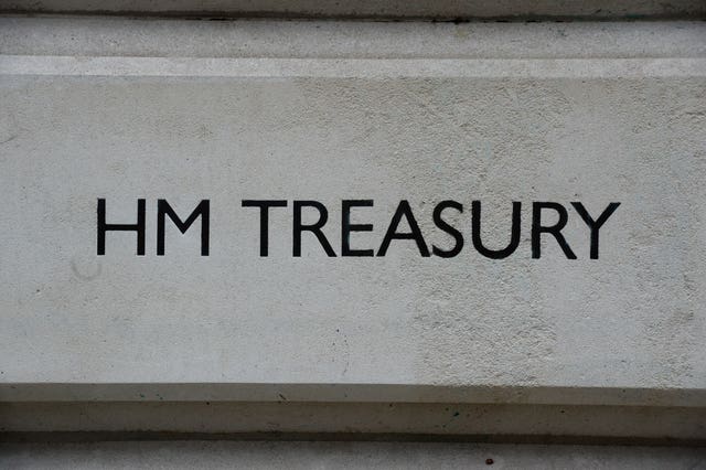 A view of signage for HM Treasury in Westminster, London