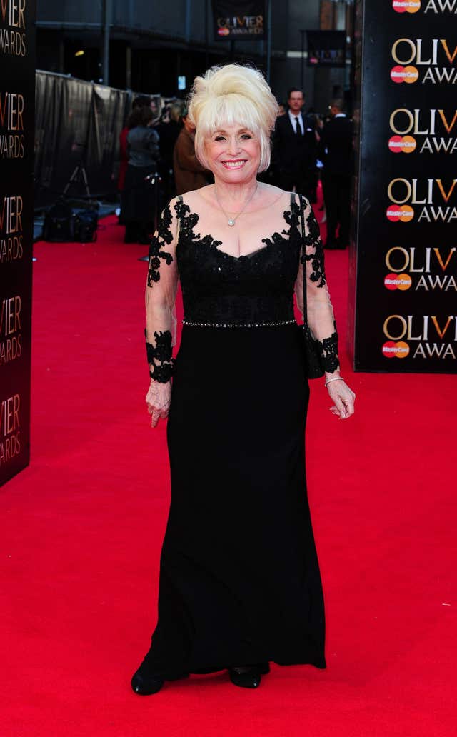 Barbara Windsor in a black dress on the red carpet in 2014