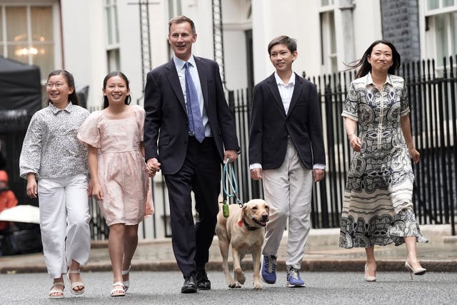 Outgoing Conservative chancellor of the exchequer Jeremy Hunt, with his wife Lucia and their children Jack, Anna and Eleanor, leaves 11 Downing Street after the Labour Party won a landslide victory at the 2024 General Election