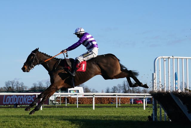 Rare Edition ridden by Sam Twiston-Davies goes on to win the at Kempton on Boxing Day