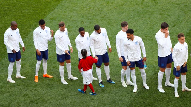 Alysia shaking hands with England