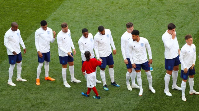 Alysia shaking hands with England