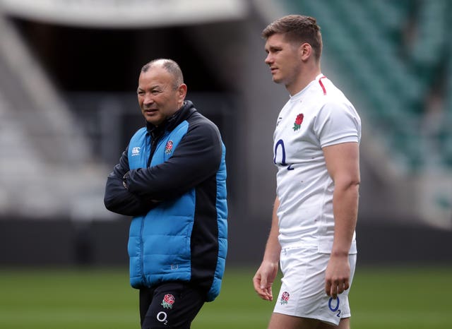 Eddie Jones (left) replaced Owen Farrell (right) late in the game