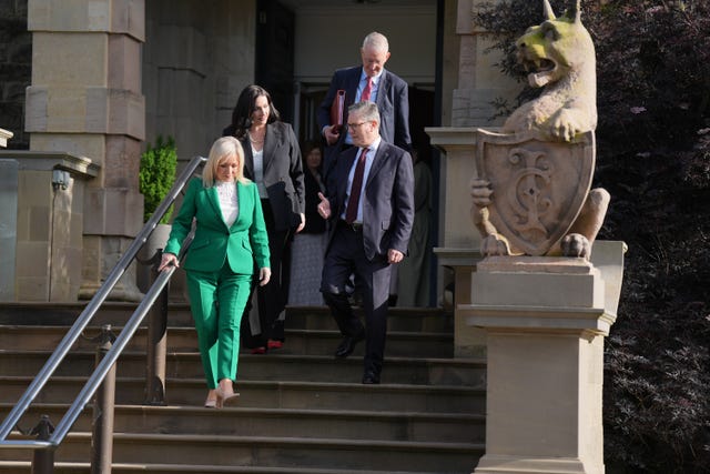 Prime Minister Sir Keir Starmer after meeting Northern Ireland Secretary Hilary Benn, First Minister Michelle O&rsquo;Neill and deputy First Minister Emma Little-Pengelly walking down steps at Stormont