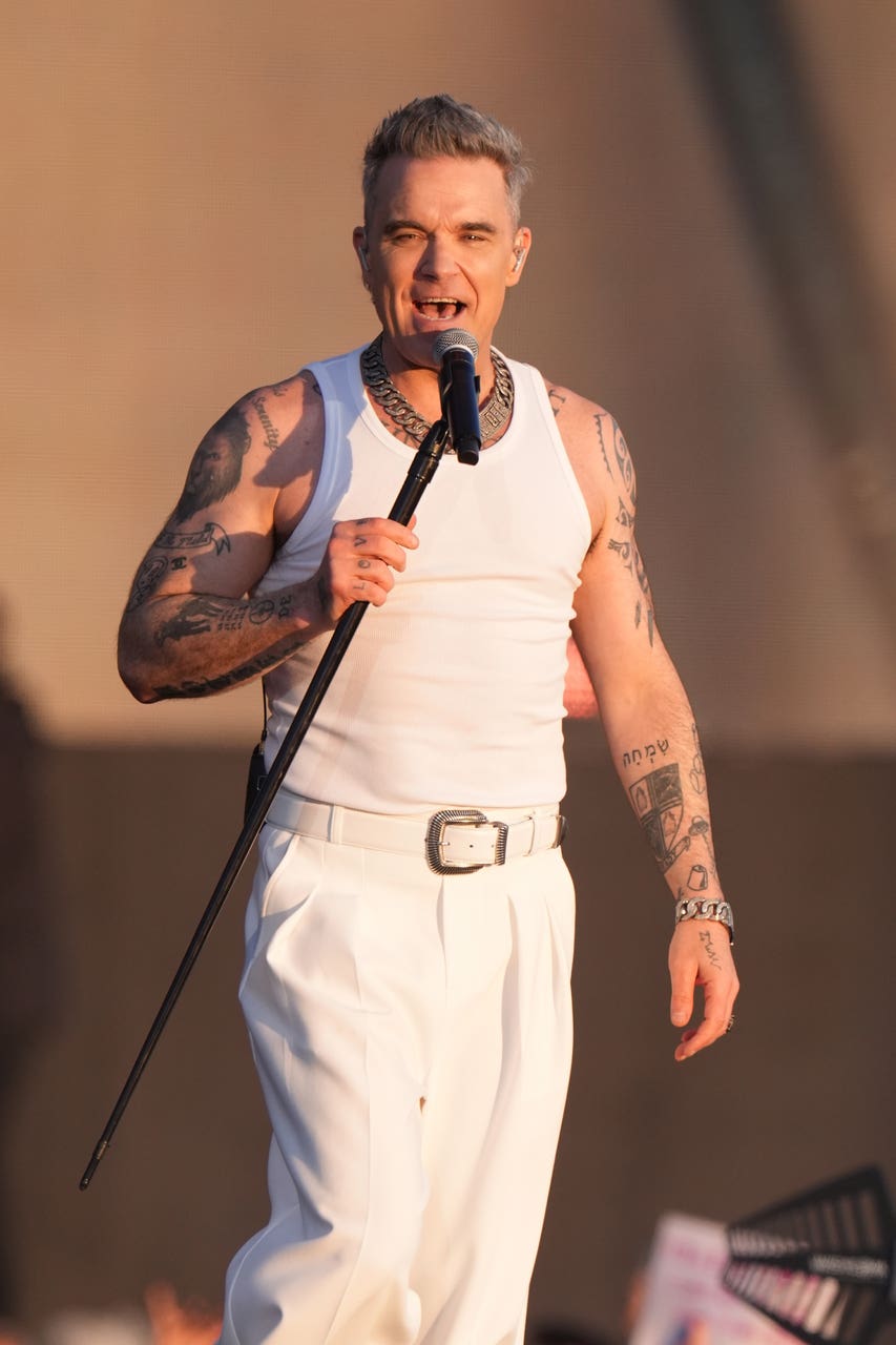 Robbie Williams and Katie Waissel call for young artist care after