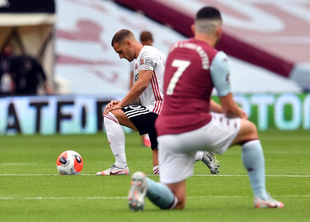 All players on the pitch at Villa Park and the Etihad Stadium took a knee prior to kick-off (Paul Ellis/NMC Pool)