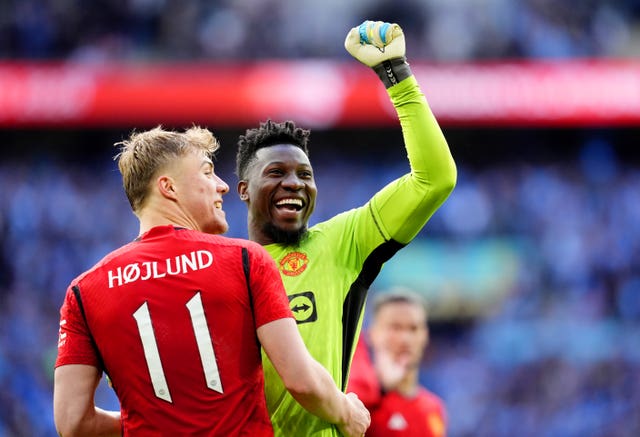 Rasmus Hojlund (left) and goalkeeper Andre Onana celebrate at the end of the match