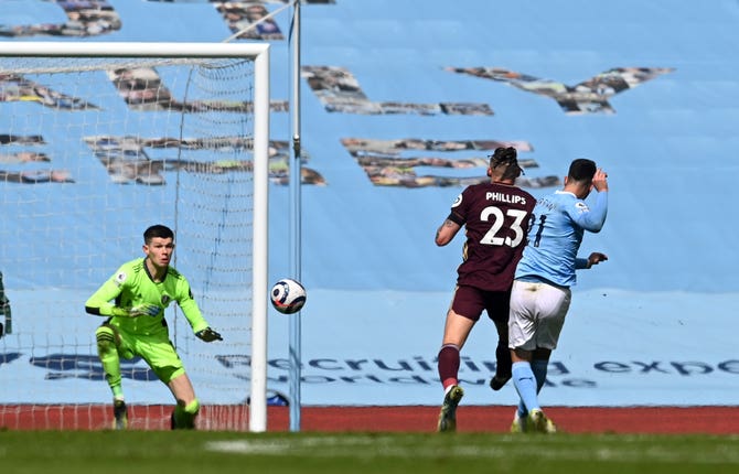 Ferran Torres (right) scores the equaliser 