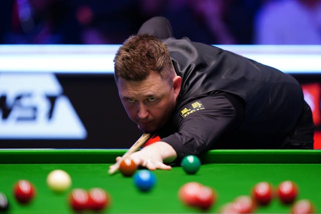 Kyren Wilson lines up a shot