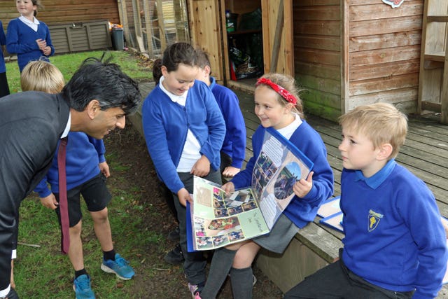 Rishi Sunak with pupils from the Pickhill Church of England Primary School eco team near Thirsk, North Yorkshire 