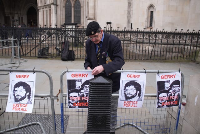 Protesters outside the Royal Courts of Justice in central London