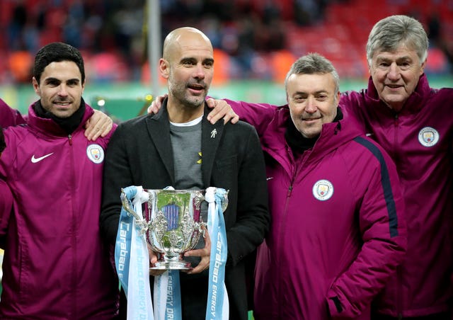 Arteta (left) helped Manchester City win the Premier League and Carabao Cup this season