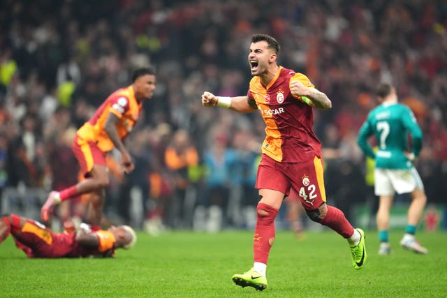Galatasaray’s Abdulkerim Bardakci (centre) and team-mates celebrate following victory, as Liverpool’s Florian Wirtz (right) appears dejected, after the UEFA Champions League, league stage match at RAMS Park in Istanbul, Turkey, in September