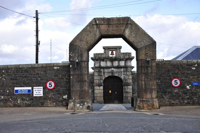 The arched stone entrance to HM Prison Dartmoor in Devon