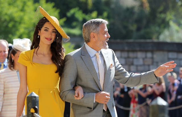Amal and George Clooney are among the guests at St George's Chapel for the noon ceremony (Gareth Fuller/PA)