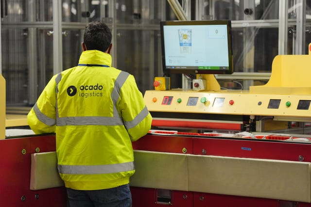 A worker at an Ocado distribution warehouse 