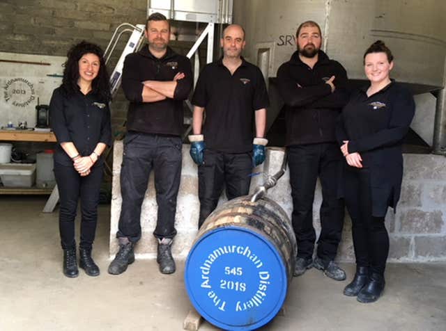 Ardnmurchan distillery employees (l to r) Valentina Donsi, Scott Stewart, Ali Fisher, Alistair MacKay and Sophie Yorke filling the first cask (Ardnamurchan Trust/PA)