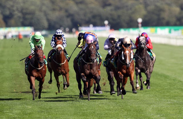 Tarboosh (centre) on his way to winning at Doncaster