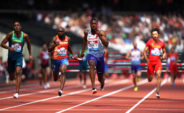 Great Britain's Nethaneel Mitchell-Blake (centre) on the way to winning the men's 4x100m relay