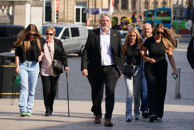 The father of Elle Edwards, Tim Edwards, arrives with family members at court