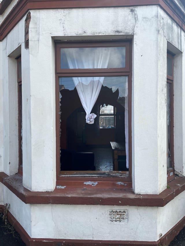 A broken window after serious disorder broke out on Monday night in Ballymena
