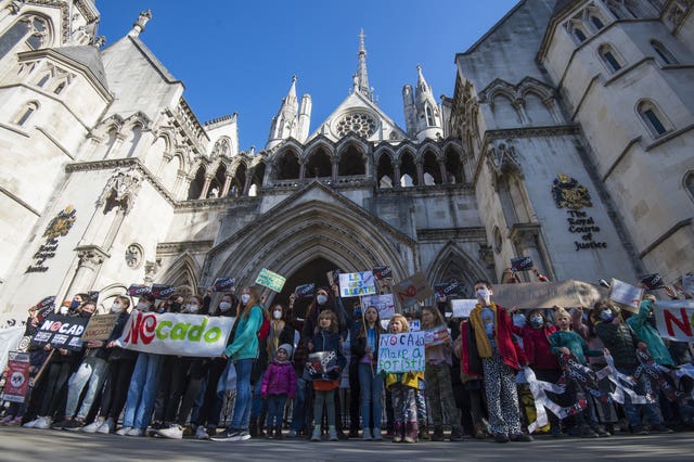Children from Yerbury Primary School in Islington, north London, take part in a protest outside the High Court in May