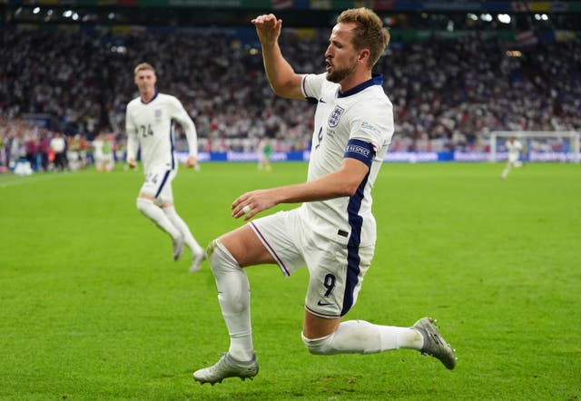 England’s Harry Kane celebrates after scoring their side’s second goal of the game during the win over Slovakia