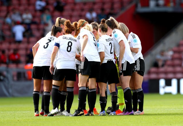 Northern Ireland players in a huddle