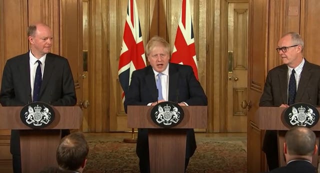 Prime Minister Boris Johnson (centre) with chief medical officer for England Chris Whitty (left) and chief scientific adviser Sir Patrick Vallance (right), speaking during a press conference, at 10 Downing Street, in London (TV Pool/PA)