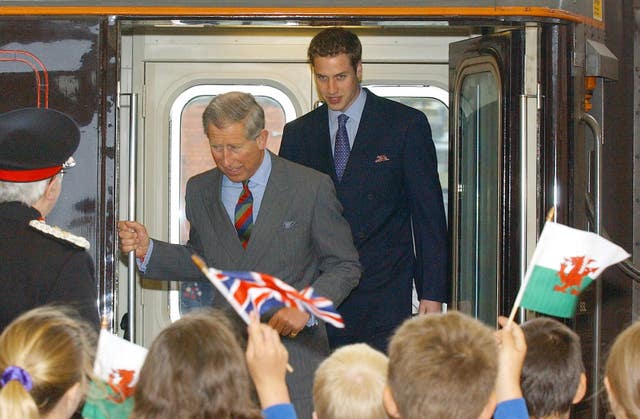 Prince William and Charles arriving at Bangor Station in 2003 