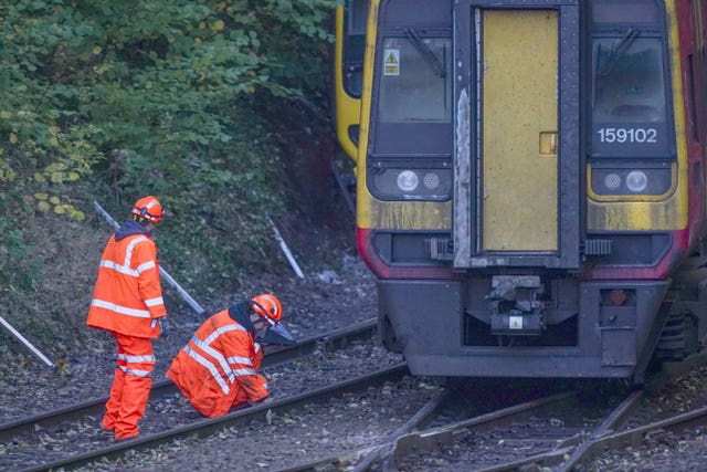 Investigators at the scene of the crash